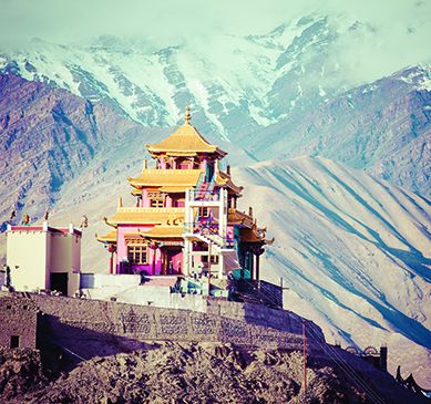 A yellow Temple on a mountain peak in Ladakh
